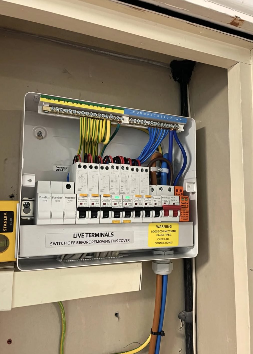 New consumer unit installed inside a cupboard